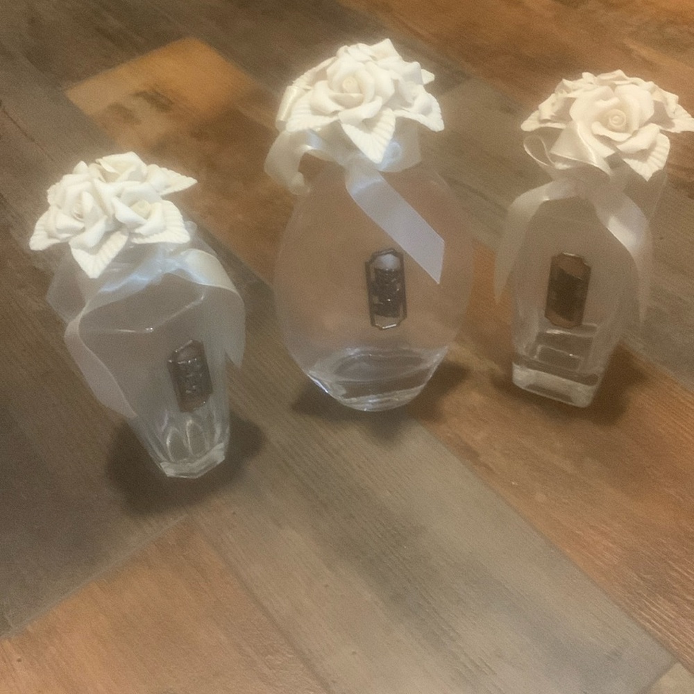 Set of three Cellini bottles in excellent condition with stoppers